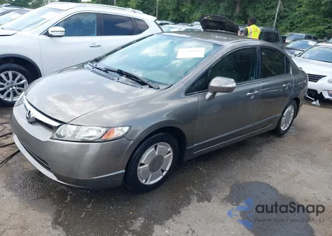 2007 Honda Civic Hybrid from USA, damaged, VIN JHMFA362X7S031612